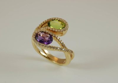 14 kt gold mother's ring with amethyst, peridot, and diamond