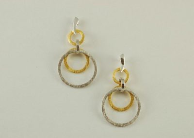 Sterling silver earrings with yellow gold plated accents