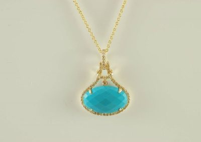 14 kt gold turquoise and diamond pendant