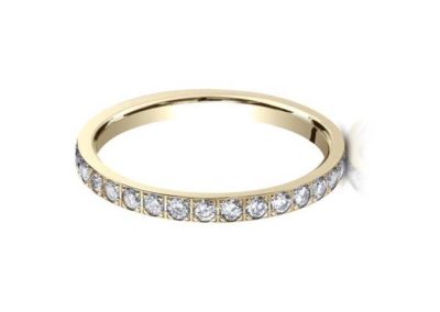 Women's gold wedding band with diamonds