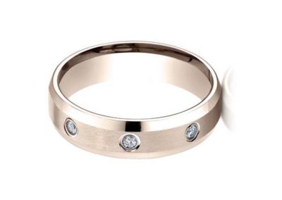 Rose gold wedding band with flush mounted diamonds, beveled edge, matte finish