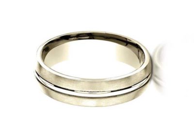 Gold wedding band with white gold inlay and matte finish