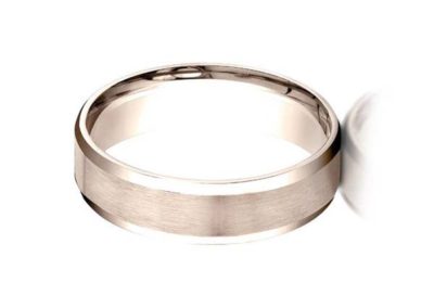 Rose gold wedding band with beveled edge and matte finish