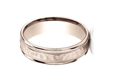 Rose gold carved wedding band with hammered finish