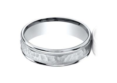 White gold carved wedding band with hammered finish