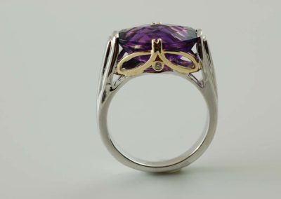 Sterling silver amethyst and diamond ring with 18 kt yellow gold accents