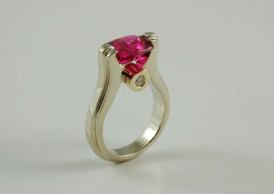 Custom designed 14 kt white and yellow gold ring with pink tourmaline and diamond