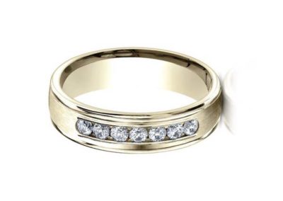 Gold wedding band with channel set diamonds, matte finish