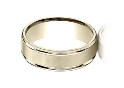 Gold carved wedding band with matte finish
