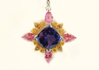 14 kt white and yellow gold pendant with tanzanite, pink sapphire, and diamonds