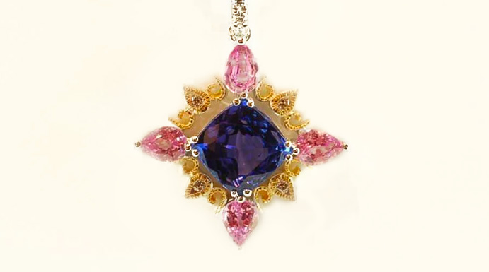 14 kt white and yellow gold pendant with tanzanite, pink sapphire, and diamonds