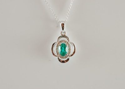 14kt white gold emerald and diamond pendant