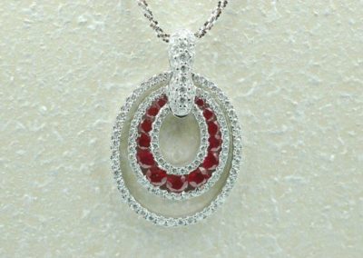 18 kt white gold ruby and diamond pendant