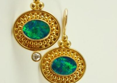 boulder opal earrings in 18kt and 22kt yellow gold