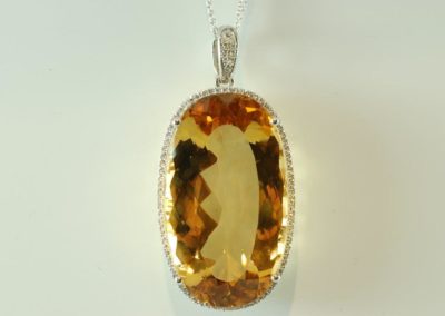 citrine and diamond pendant in 14kt white gold