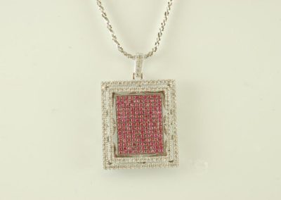 pink sapphire and diamond pendant in 14kt white gold